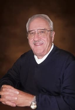Dr.