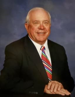 Dr.