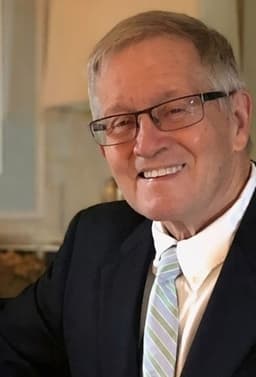 Dr.