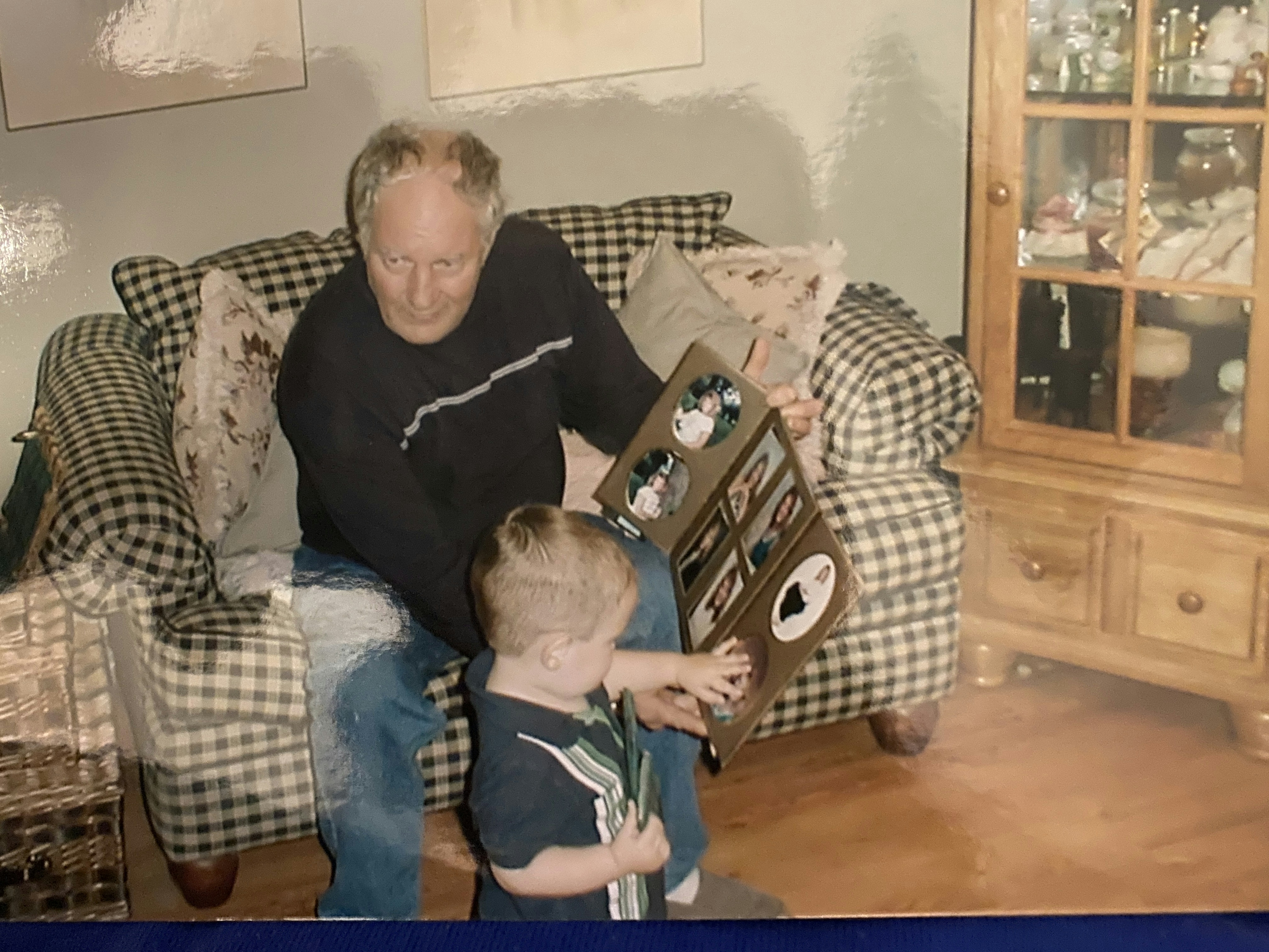 Grampa showing off Juli's pic with Cole, 2004 (Mark E Cromlich's Memorial)